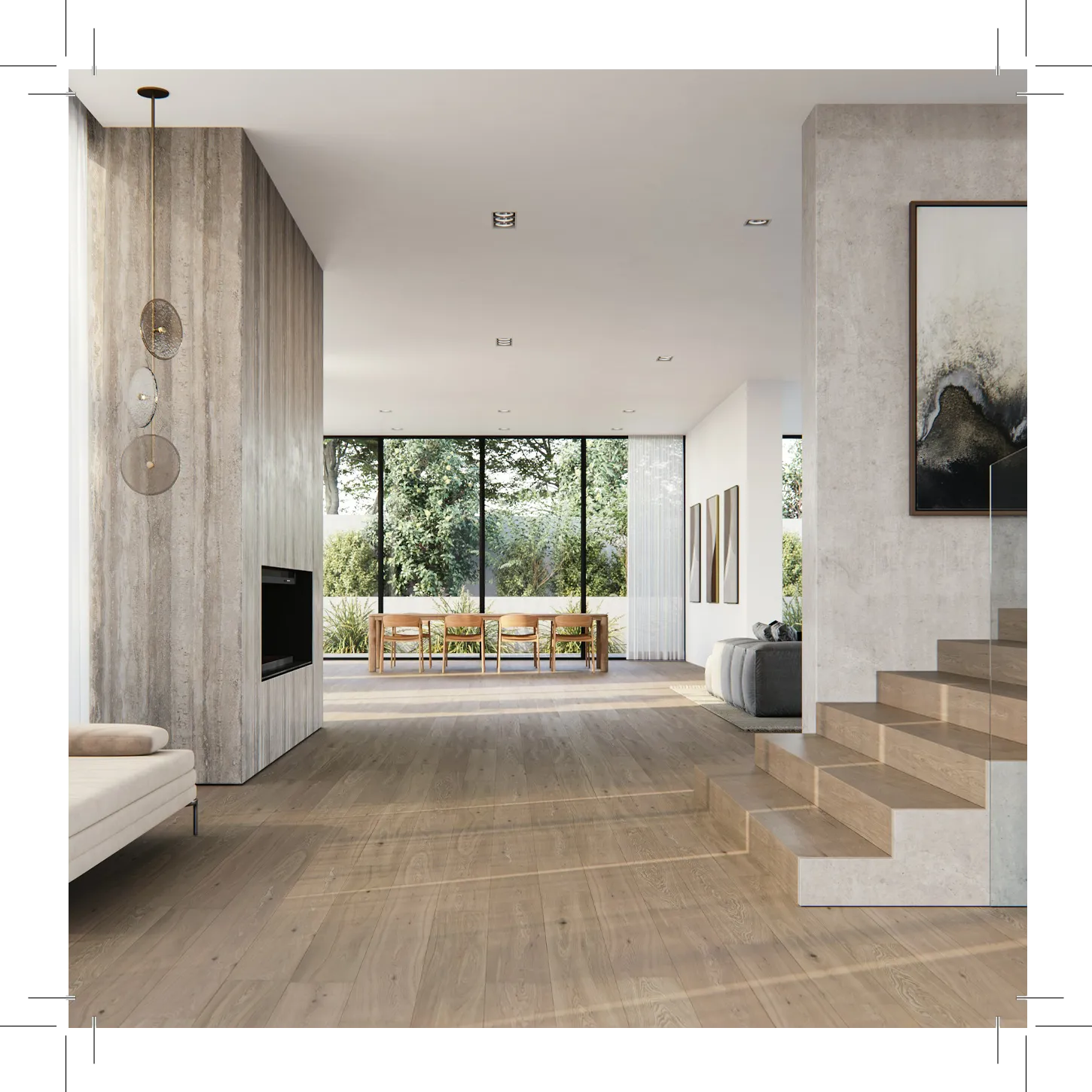 Living space with sofa, stairs, wall art, and big windows