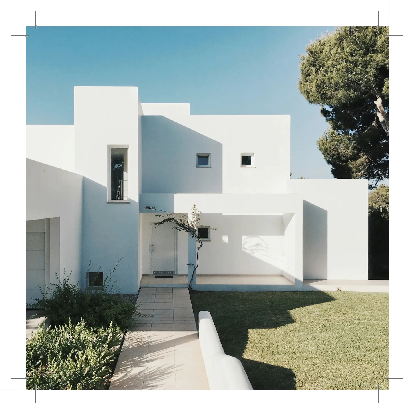 Modern house California real estate with big windows and greenery